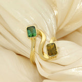 18ct Yellow Gold 2 Stone Green & Yellow Emerald Cut Tourmaline Rub-over Set Spiral Ring