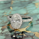Platinum Laboratory-Grown 1.50ct Oval Diamond Halo Ring with Diamond Shoulders