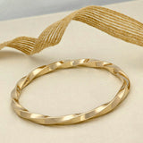 Pre-loved Solid 9ct Yellow Gold Twist Bangle 37.5g