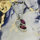 9ct White Gold Purple Rhodolite Garnet with Diamond Mix Cut Pendant