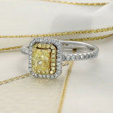 Platinum 0.62ct Yellow Radiant Cut Diamond & White Diamond Halo Ring with Diamond Shoulders