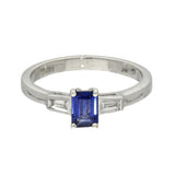 18ct White Gold 0.53ct Emerald Cut Sapphire and Tapered Baguette Diamond 3 Stone Ring