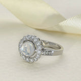 18ct White Gold Cabochon Moonstone & Diamond Halo Ring