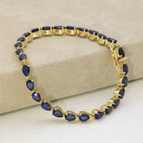Pre-owned 14ct Yellow Gold Pear Cut Blue Synthetic Sapphire Line Bracelet