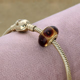 Pre-loved Pandora 14ct Yellow Gold Brown Mystic Calla Glass Charm