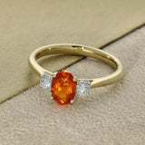 18ct Yellow Gold 0.49ct Oval Fire Opal and Diamond Trilogy Ring
