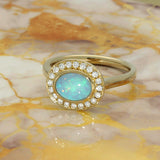 9ct Yellow Gold 0.76ct Oval Opal East/West Rub-over Set Diamond Halo Ring