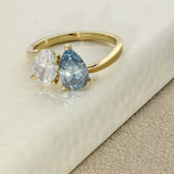 18ct Yellow Gold Laboratory-Grown Blue Pear Cut & White Oval Diamond Toi et Moi Ring