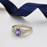 9ct Yellow Gold Oval Tanzanite & 0.27ct Diamond Cluster Ring