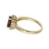 9ct Yellow Gold Oval Garnet and Diamond Halo Ring