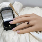9ct Yellow Gold Oval Garnet and Diamond Halo Ring