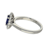 Platinum 0.83ct Oval Sapphire and Diamond Scallop Edge Halo Ring