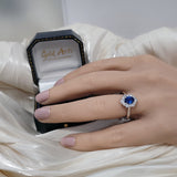 Platinum 0.83ct Oval Sapphire and Diamond Scallop Edge Halo Ring