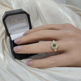 18ct Yellow Gold Green Sapphire Hexagonal Halo Ring with Trapeze Cut Diamond Shoulders