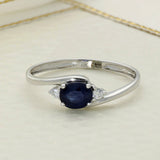 9ct White Gold East-West Set Oval Sapphire and Diamond 3 Stone Twist Ring