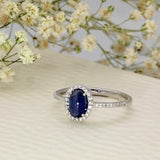 9ct White Gold Oval Cabochon Sapphire With Diamond Halo & Shoulders Ring