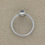 9ct White Gold Oval Cabochon Sapphire With Diamond Halo & Shoulders Ring