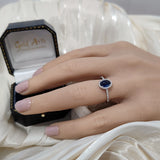 9ct White Gold Oval Cabochon Sapphire With Diamond Halo & Shoulders Ring
