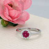 9ct White Gold Round Cabochon Ruby & Diamond Halo Ring