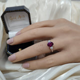 9ct White Gold 1.87ct Oval Purple Garnet & Diamond Trilogy Ring