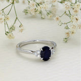 9ct White Gold 0.91cts Oval Cut Sapphire With Diamond Trefoil Shoulders Ring