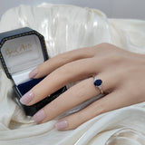 9ct White Gold 0.91cts Oval Cut Sapphire With Diamond Trefoil Shoulders Ring
