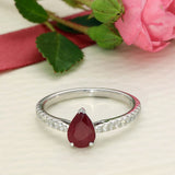 9ct White Gold 0.65ct Pear Cut Ruby With Diamond Set Shoulders