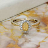 9ct Yellow Gold Oval Cabochon Yellow Opal & Diamond Halo Cluster Ring