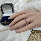 9ct White Gold Ruby & 0.12ct Diamond Claw Set Wishbone Ring