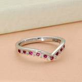 9ct White Gold Ruby & 0.12ct Diamond Claw Set Wishbone Ring