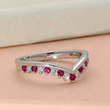 9ct White Gold Ruby & 0.16ct Diamond Claw Set Wishbone Ring