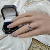 9ct White Gold Ruby & 0.26ct Diamond Claw Set Wishbone Ring