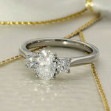 Platinum 0.90ct GIA Cert Oval Cut Diamond & 0.34ct Round Diamond Trilogy Ring