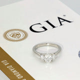 Platinum 0.90ct GIA Cert Oval Cut Diamond & 0.34ct Round Diamond Trilogy Ring
