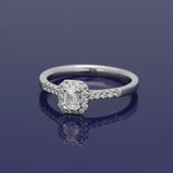 18ct White Gold 0.30ct G VVS2 Certificated Emerald Cut Diamond & Round Diamond Halo Ring