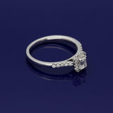 18ct White Gold 0.30ct G VVS2 Certificated Emerald Cut Diamond & Round Diamond Halo Ring