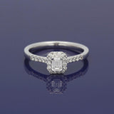 18ct White Gold 0.30ct G VVS2 Certificated Emerald Cut Diamond & Round Diamond Halo Ring