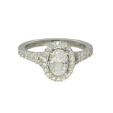 Platinum 0.71ct D SI1 Oval Cut Diamond Halo Ring with Diamond Shoulders