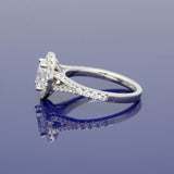 Platinum 0.71ct D SI1 Certificated Oval Cut Diamond Halo Ring with Diamond Set Shoulders