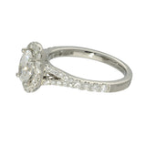 Platinum 0.71ct D SI1 Oval Cut Diamond Halo Ring with Diamond Shoulders