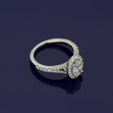 Platinum 0.71ct D SI1 Certificated Oval Cut Diamond Halo Ring with Diamond Set Shoulders