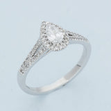 18ct White Gold 0.30ct D SI2 Certificated Pear Cut Diamond Halo Ring with Diamond Shoulders
