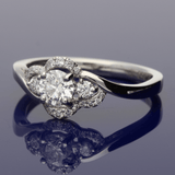 Platinum GIA 0.41ct Certified Diamond Trilogy Twist Halo Ring