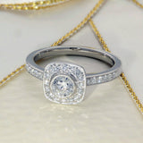 Platinum 0.66ct Total Diamond Halo Ring with Diamond Set Shoulders