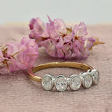 18ct Yellow Gold 0.47ct Total Oval Cut Diamond Rubover Set 5 Stone Ring