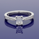 Platinum Certificated 0.53ct Emerald Cut Solitaire Ring with Diamond Shoulders