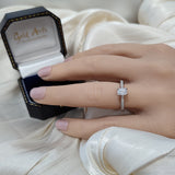 Platinum Certificated 0.53ct Emerald Cut Solitaire Ring with Diamond Shoulders