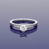 Platinum 0.50ct Diamond Solitaire Ring with Princess Cut Diamond Shoulders
