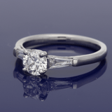 Platinum 0.71ct G SI2 Certificated Diamond Ring with Tapered Baguette Shoulders