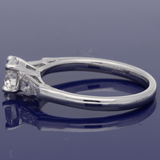 Platinum 0.71ct G SI2 Certificated Diamond Ring with Tapered Baguette Shoulders